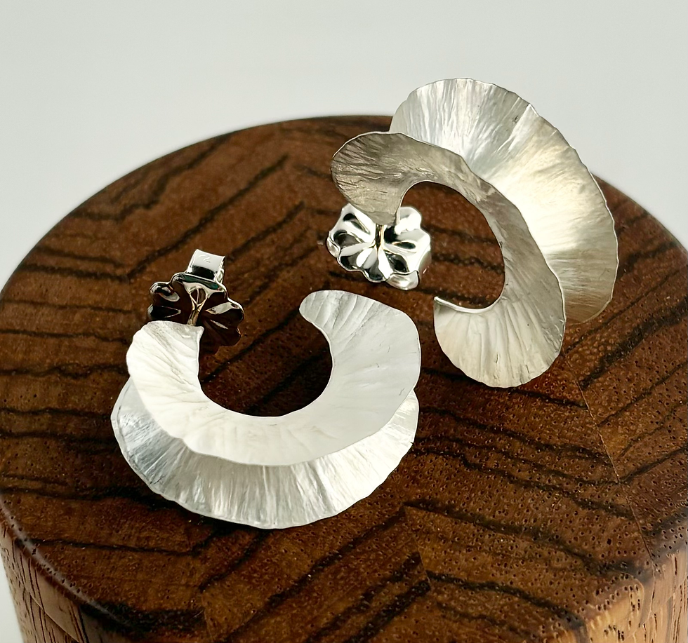 Thumbnail: Small silver feathered hoops