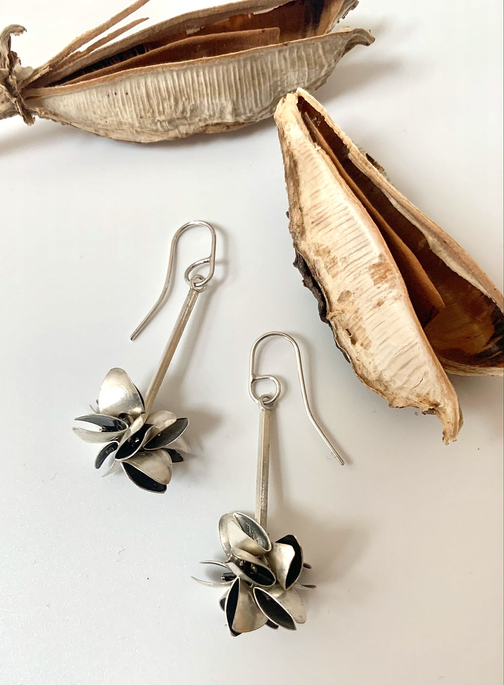 Thumbnail: Long silver pod earrings