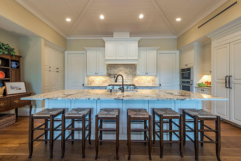 Modern farmhouse kitchen remodel with white cabinets and wood accents