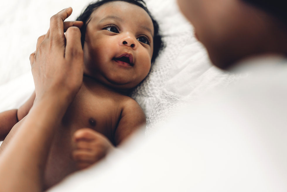 African american mother playing with ado