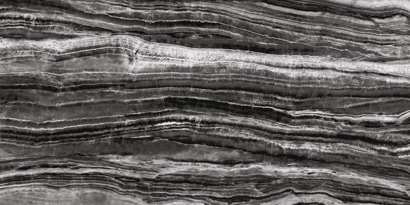 Керамогранит со слоистой текстурой натурального оникса в черно-белой гамме 