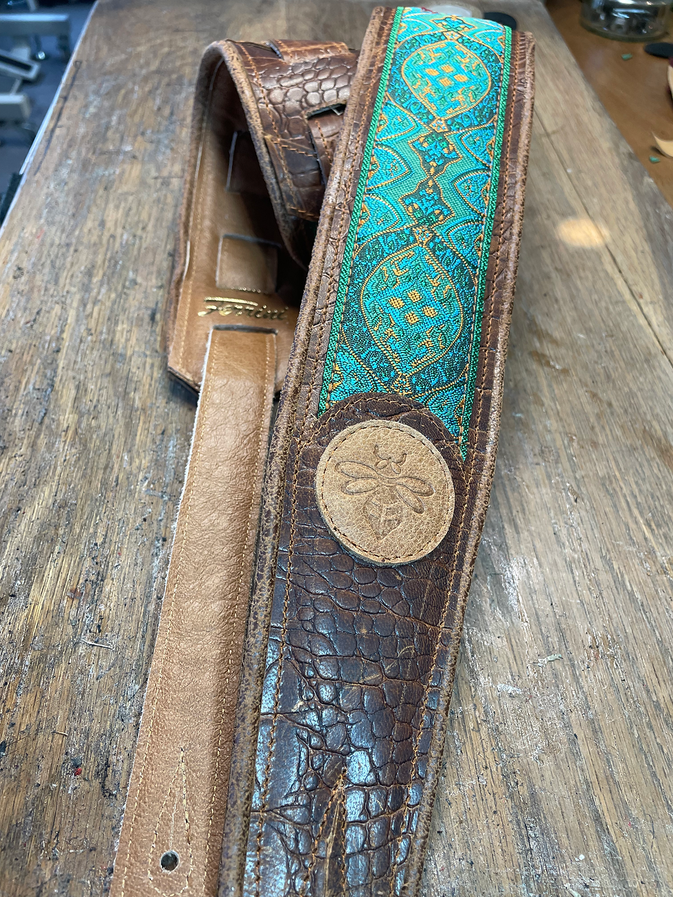 Thumbnail: Guitar strap brown alli-faux with green indian trim