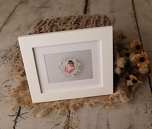 Various print sizes and finishes available for newborn photography, including framed prints and photo enlargements