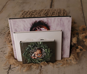Our albums featuring newborn photos, designed with premium materials and craftsmanship to offer a timeless way to remember