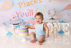 Cake smash baby doing a Dr Suess Cake Smash Session with Alana Taylor Photography