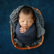 Baby boy newborn portrait captured in Melbourne studio with timeless styling and gentle posing