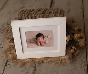 Pricing options for high-resolution digital images of newborn photos, offering flexibility for sharing and printing