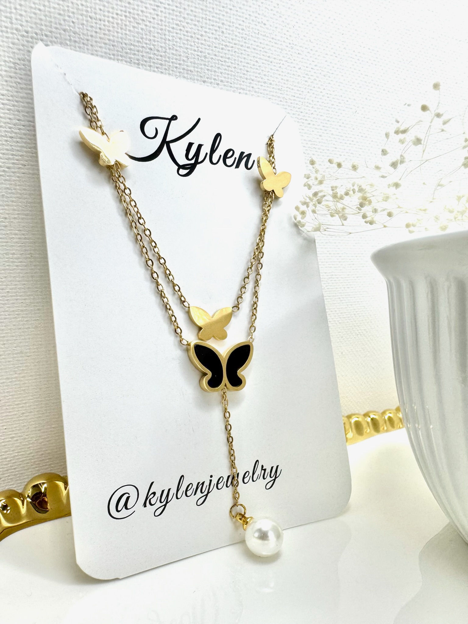 Double Layered Butterfly with Pearl Necklace