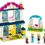 Thumbnail: Inhoud van LEGO Friends Stephanie's Familiehuis 41398: Familiehuis, schommel, minifiguren, hond en fiets 
