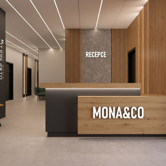 Stylová recepce v komplexu MONA@CO s minimalistickým osvětlením a dřevěným obložením.