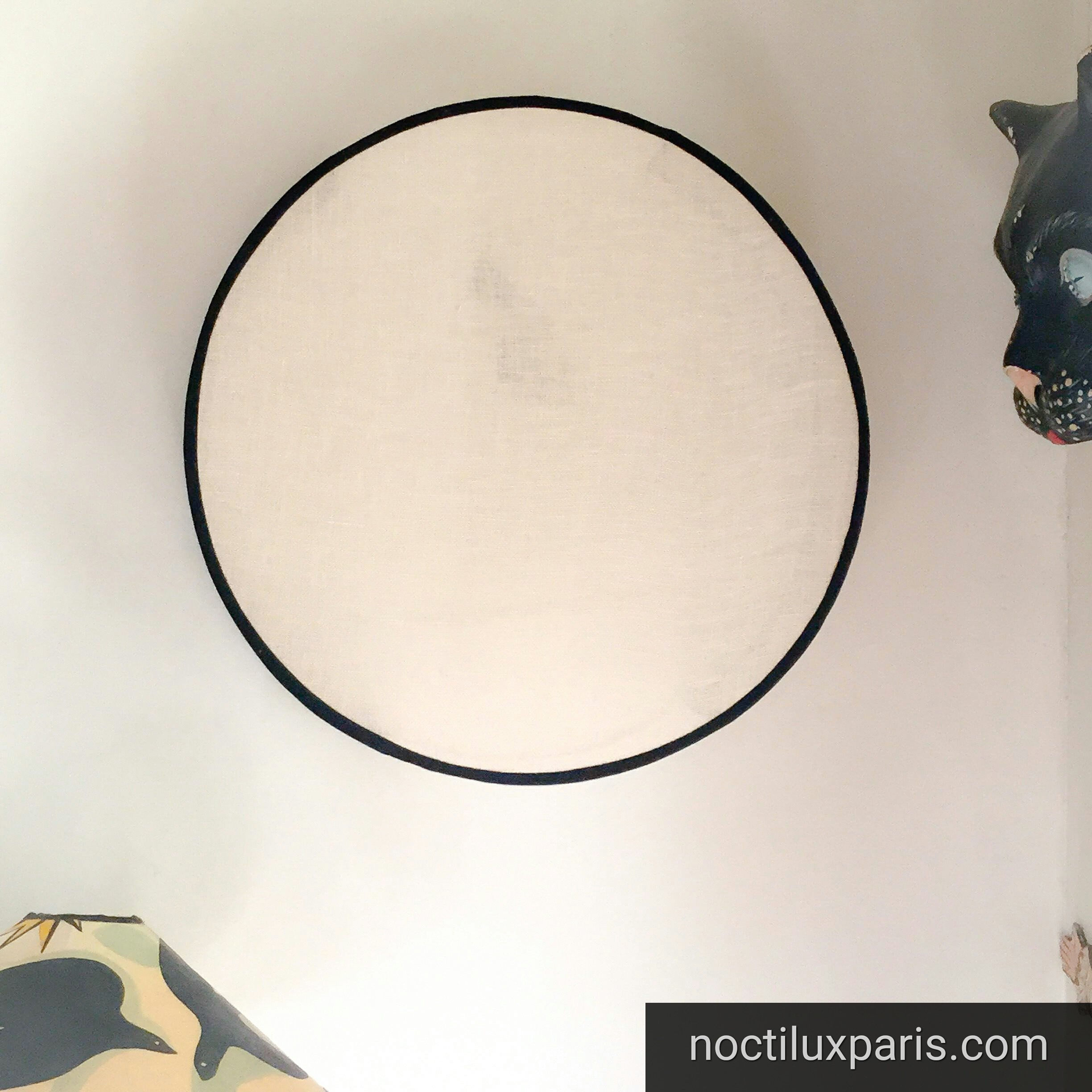 Applique murale tambour en voile de lin.