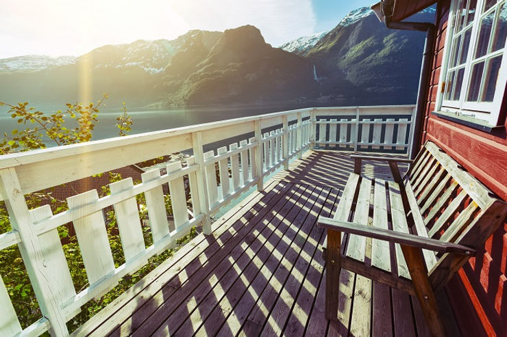 Home on a lake with mountains