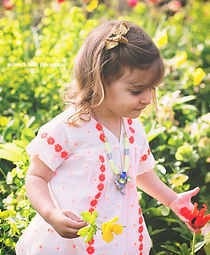 Gorgeous toddler exporing the spring flowers - natural light child portrait, Central Park Shakespeare Garden - Andreea B. Ballen Photography, New York child and family photographer