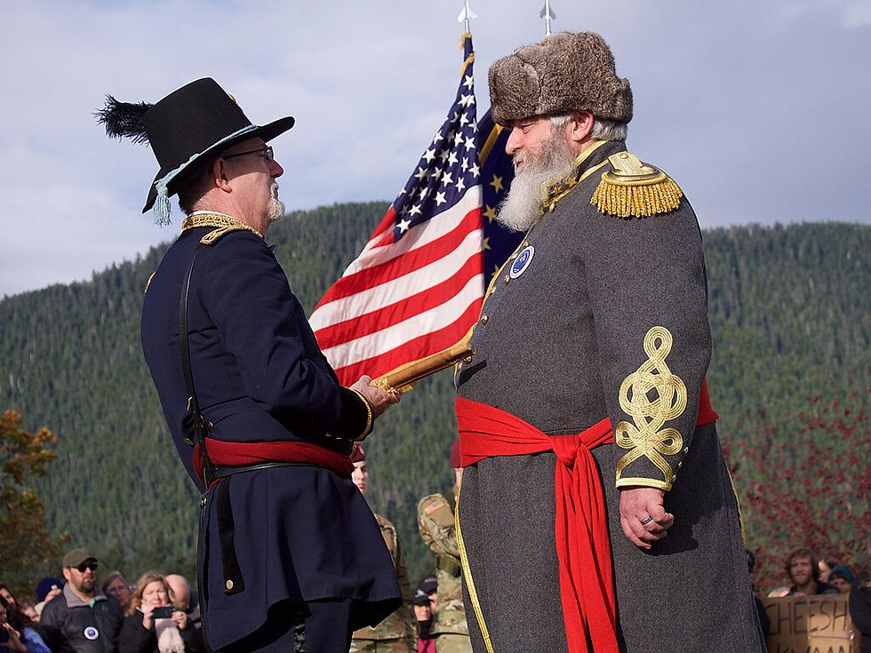 Jay Sweeney (left), portraying Army Maj. Gen. Lovell Rousseau, and Ron Conklin, portraying Russian Commissioner Alexi Peschouroff, reenact the transfer of Alaska from Russia to the United States at Castle Hill, Sitka, Alaska, during the Oct. 18, 2017. The reenactment was 150 years after the actual event in 1867. (U.S. Army National Guard photo by Sgt. David Bedard/released)