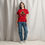 Pikkukuva: Woman wearing unisex T-shirt with print of a Gorilla on fire about to lift a heavy barbell