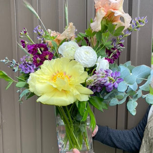 Standard sized, seasonal, fresh cut, chemical free flower arrangement for your event