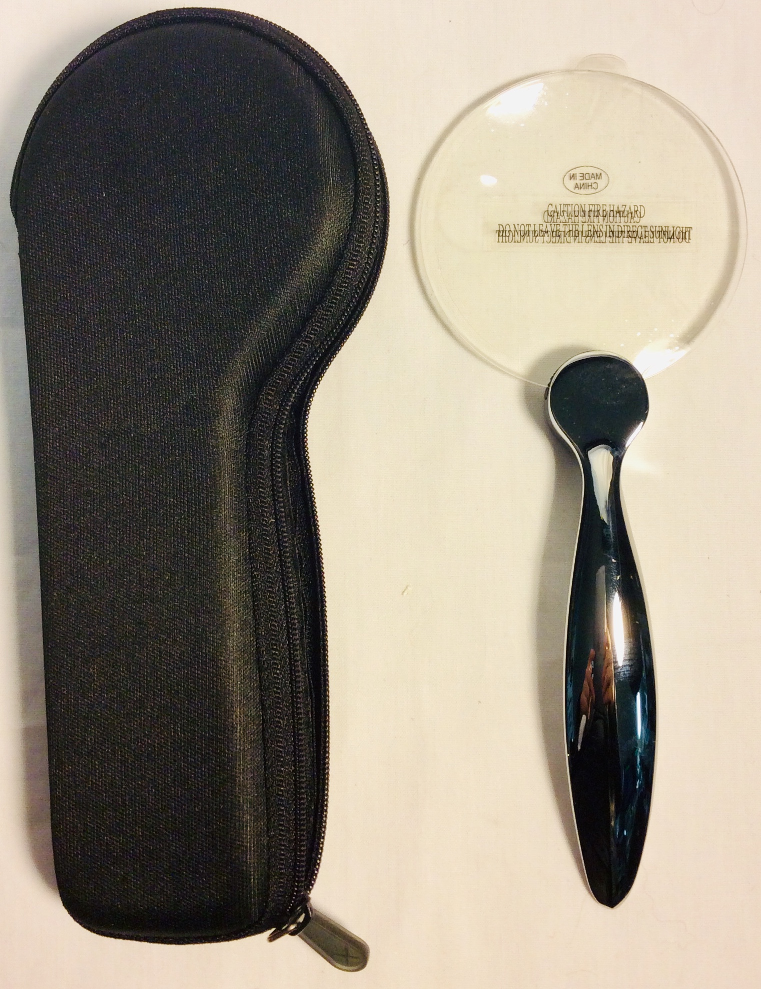 Magnifying glass with silver handle