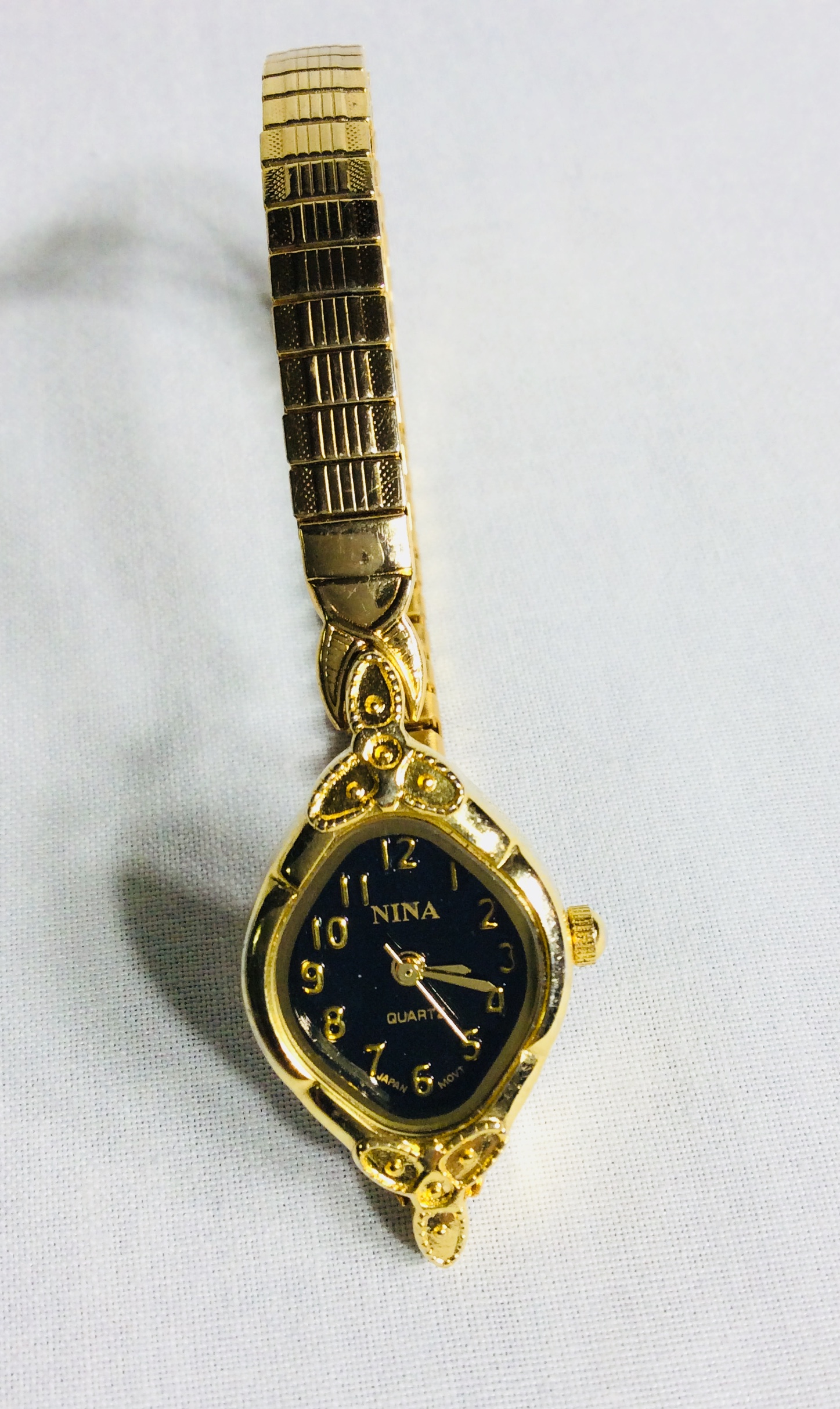 Nina gold watch