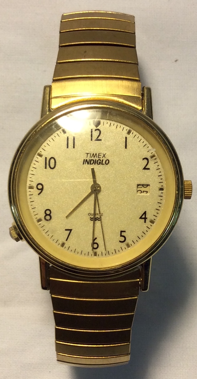Timex Light gold face, gold casing