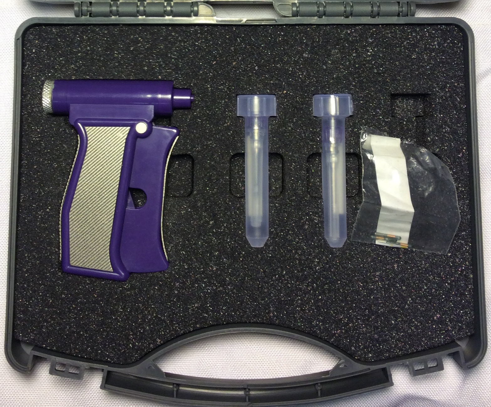 Purple plastic RFID implant gu