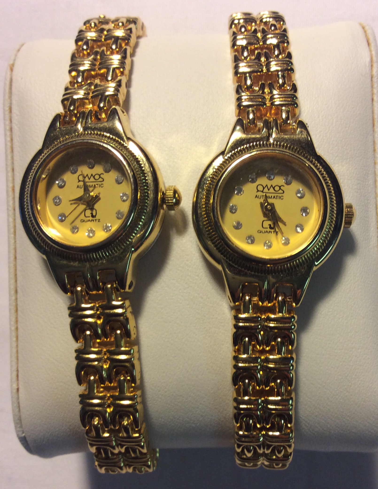 Qiomos watch - round gold face