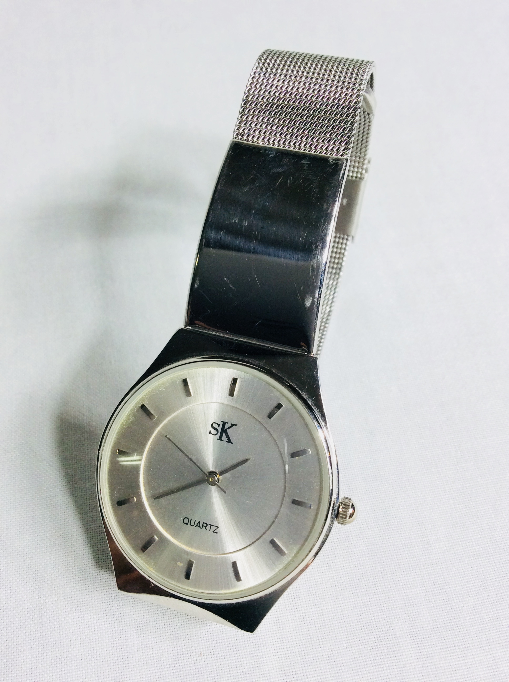 SK silver watch