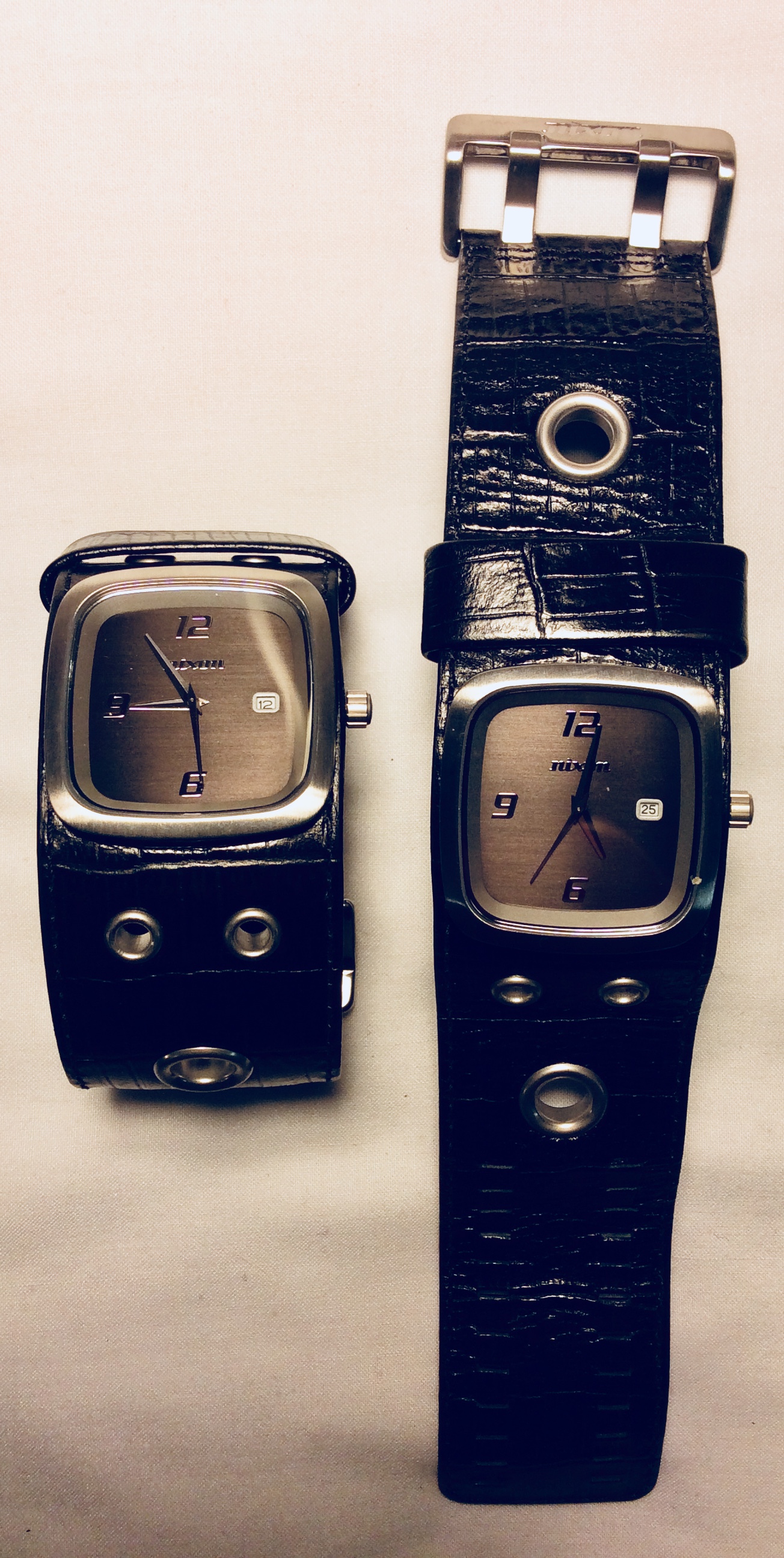 Grey steel face watch