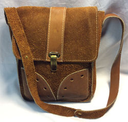 Rough brown leather bag