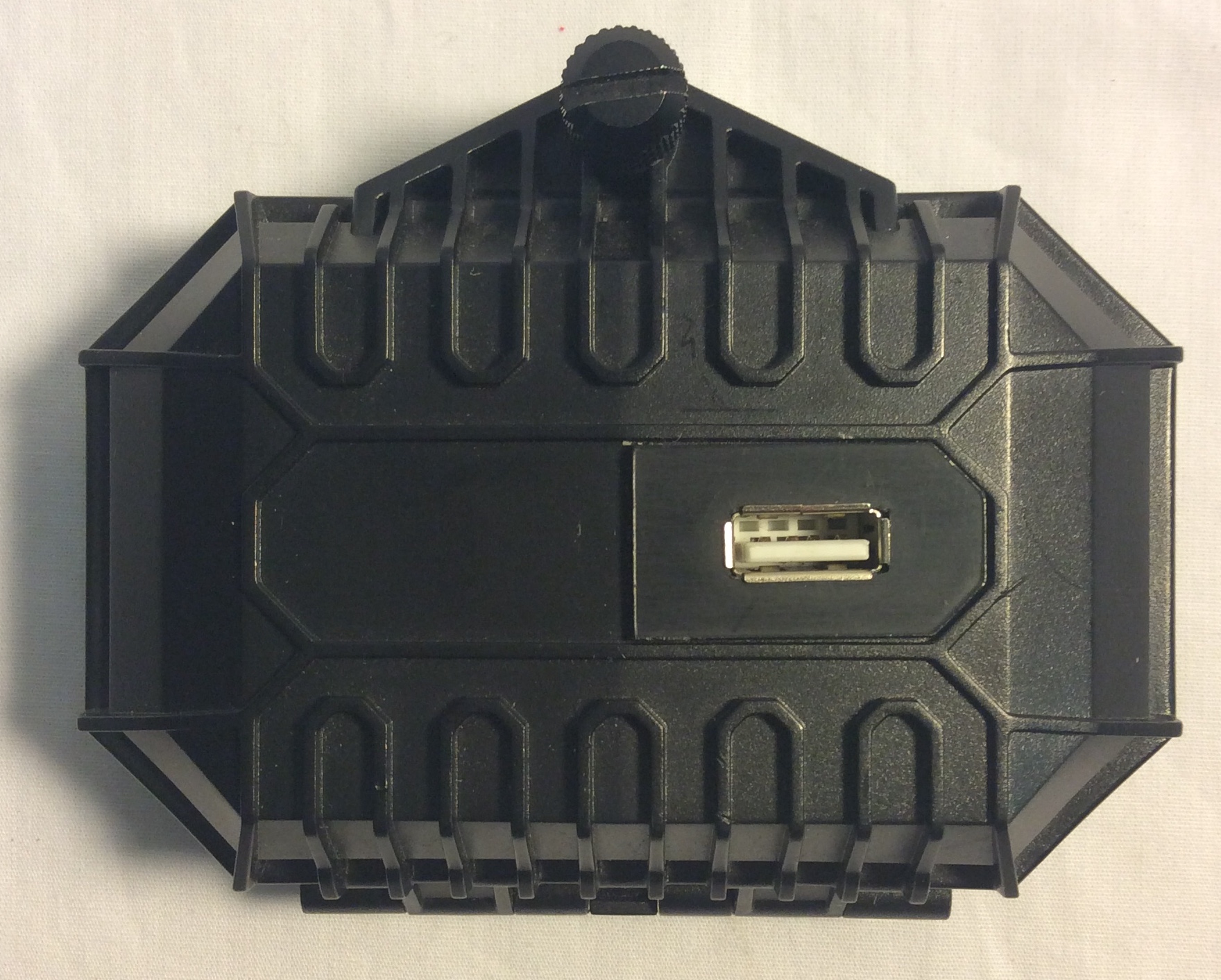 Black plastic box with USB plug