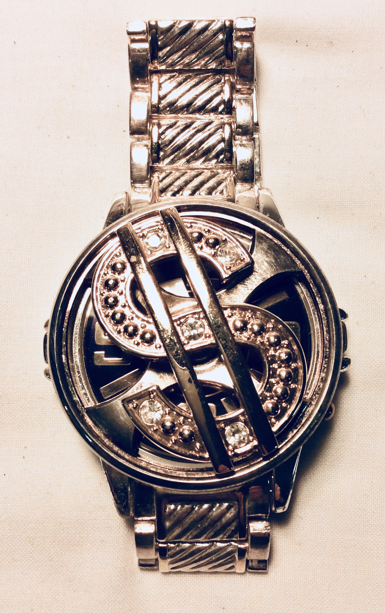 Dollar sign spinner watch