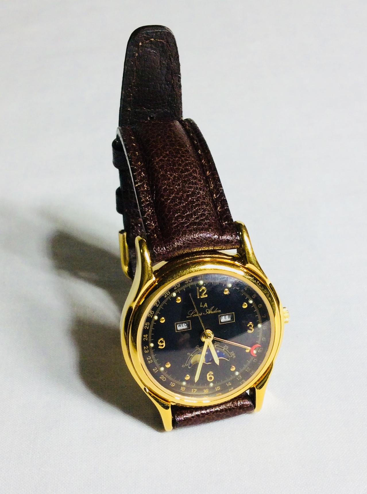LA watch with red moon