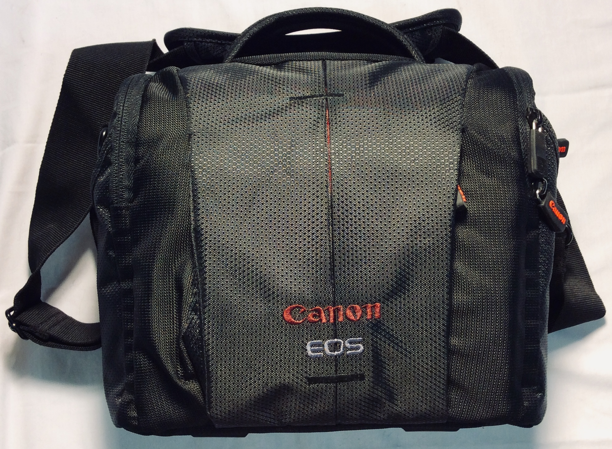 Canon EOS black carry case, red