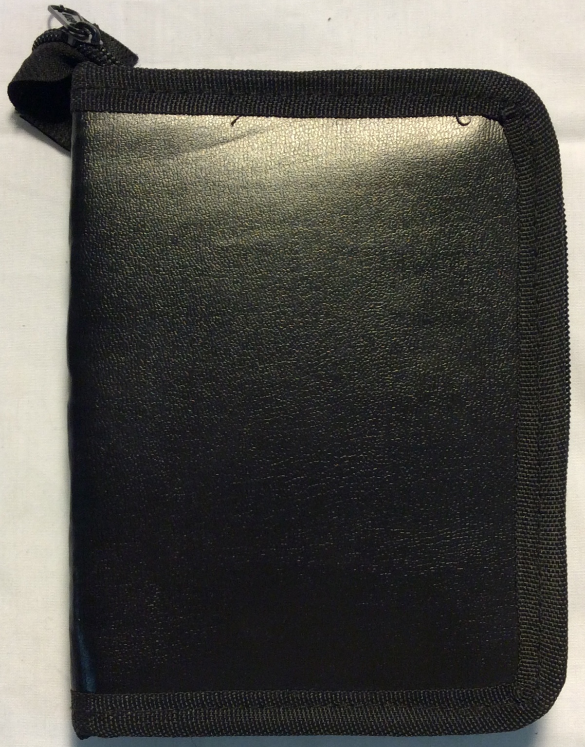 Small black leather binder