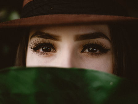 A close-up of a brunette woman's eyes.
