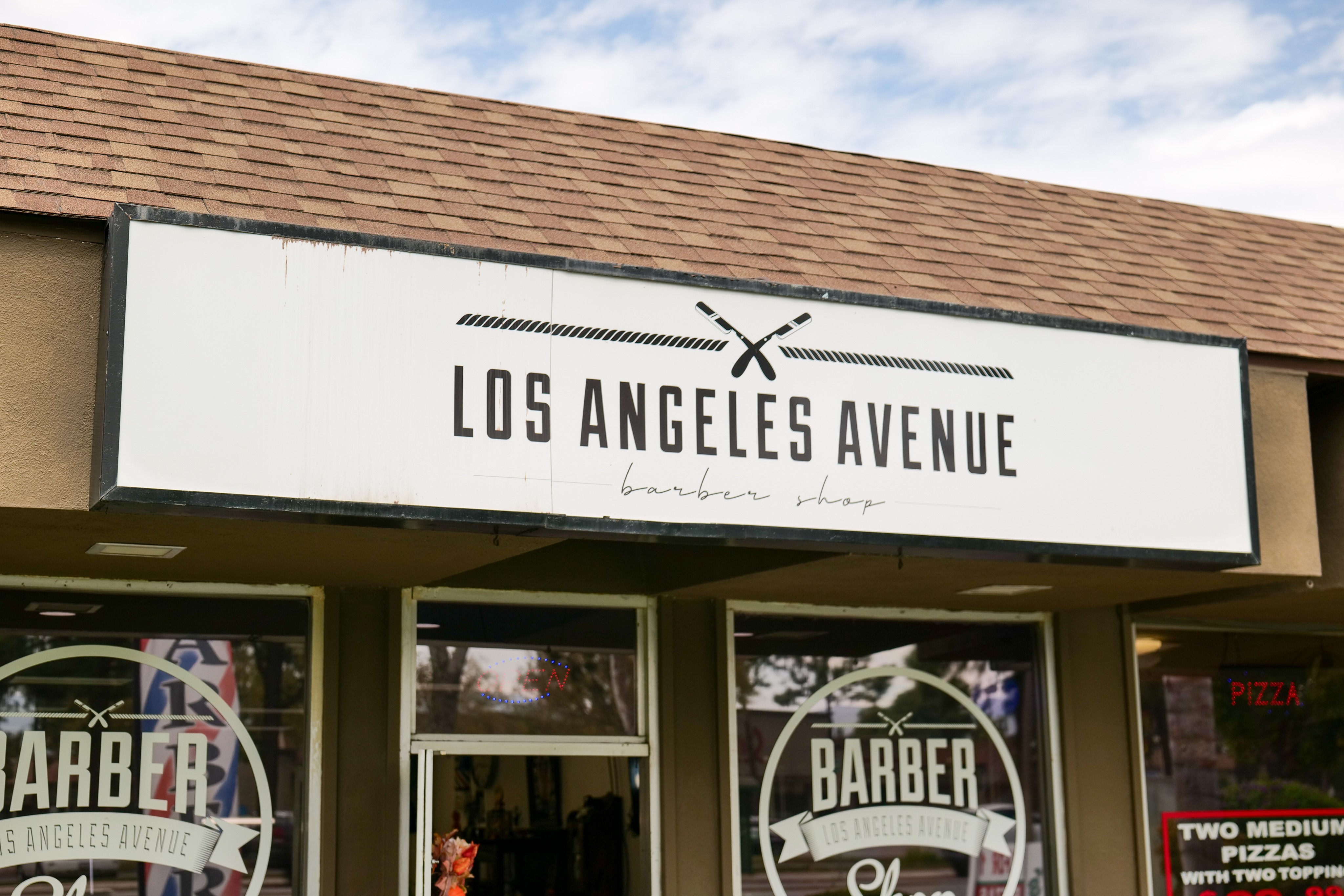 Los Angeles Avenue Barbershop logo