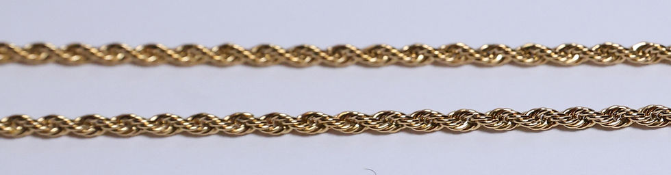 Thumbnail: "Elegant gold rope chain, a stylish and timeless accessory for men and women."