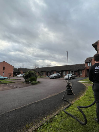 Cleaning gutters for a property management company at a retirement home using a gutter vacuum system in Pinner, Harrow.