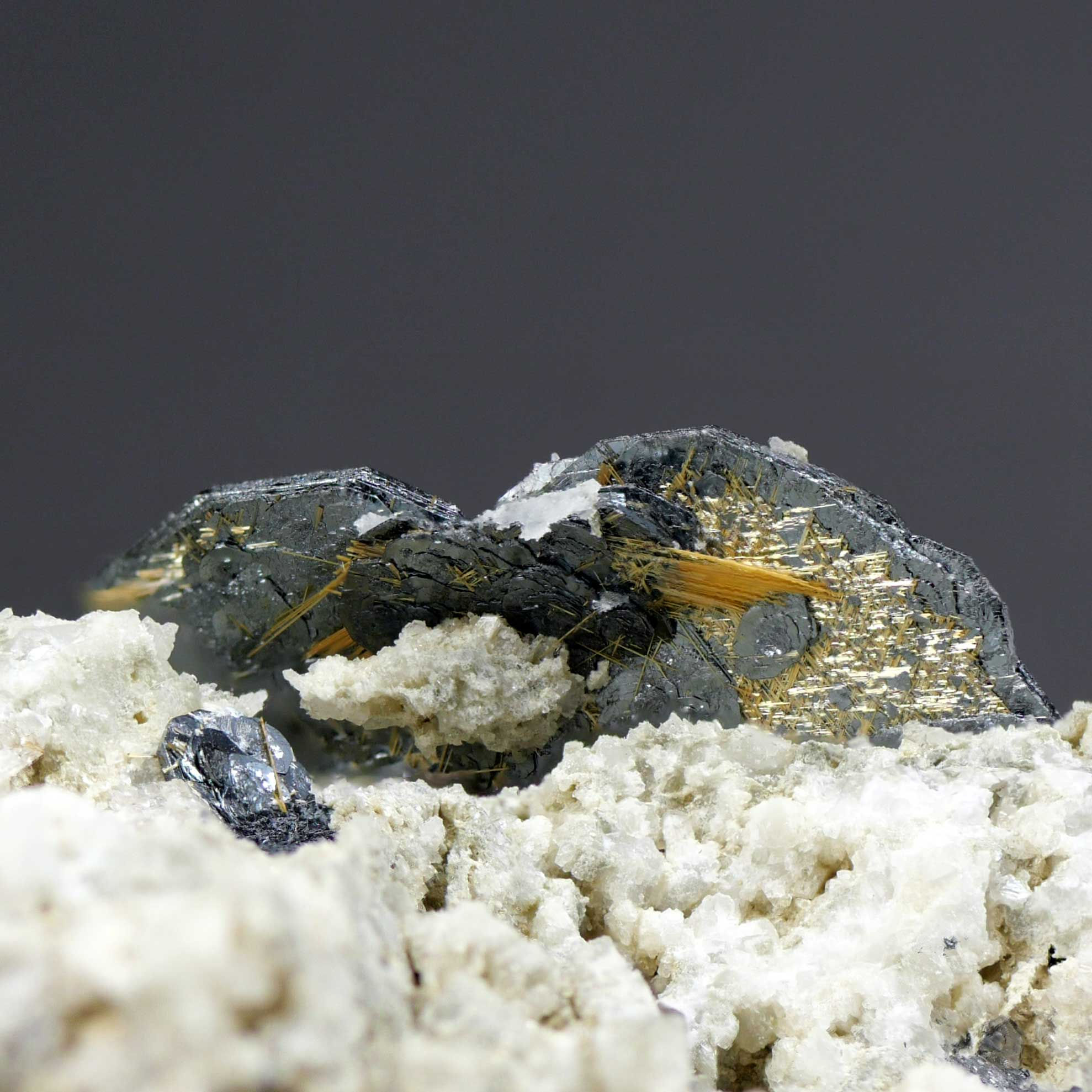 Hematite with golden rutile - Furka Pass, Uri, Switzerland