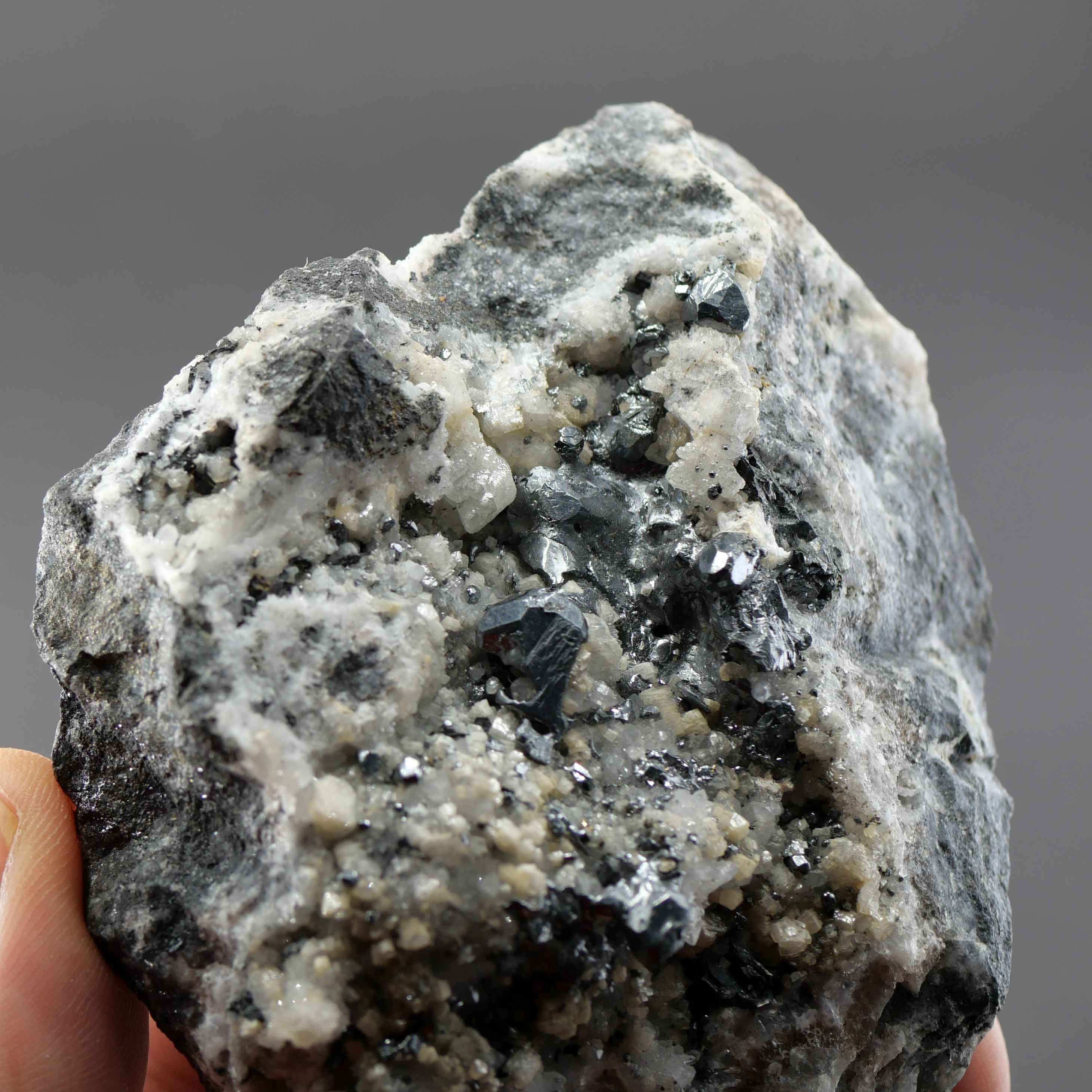 Acanthite, Stephanite, Polybasite, Calcite – Fresnillo de Gonzalez, Mexico