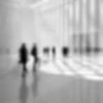 Blurred Figures Indoors