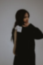 hairstylist posing with hair extension swatches