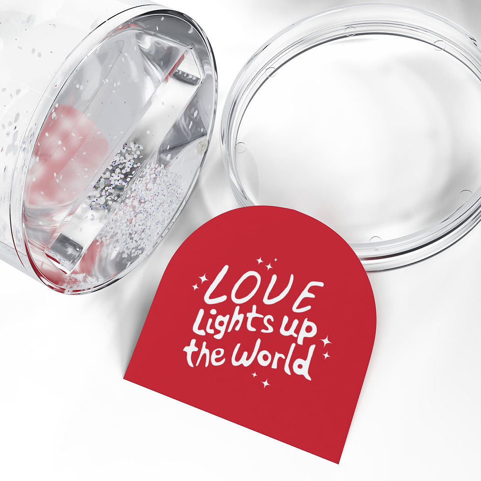 Thumbnail: Red snow globe with white handwritten text that reads “Love lights up the world,” surrounded by floating sparkles.