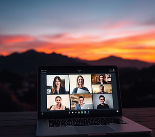 webinar on laptop with warm hues.jpg