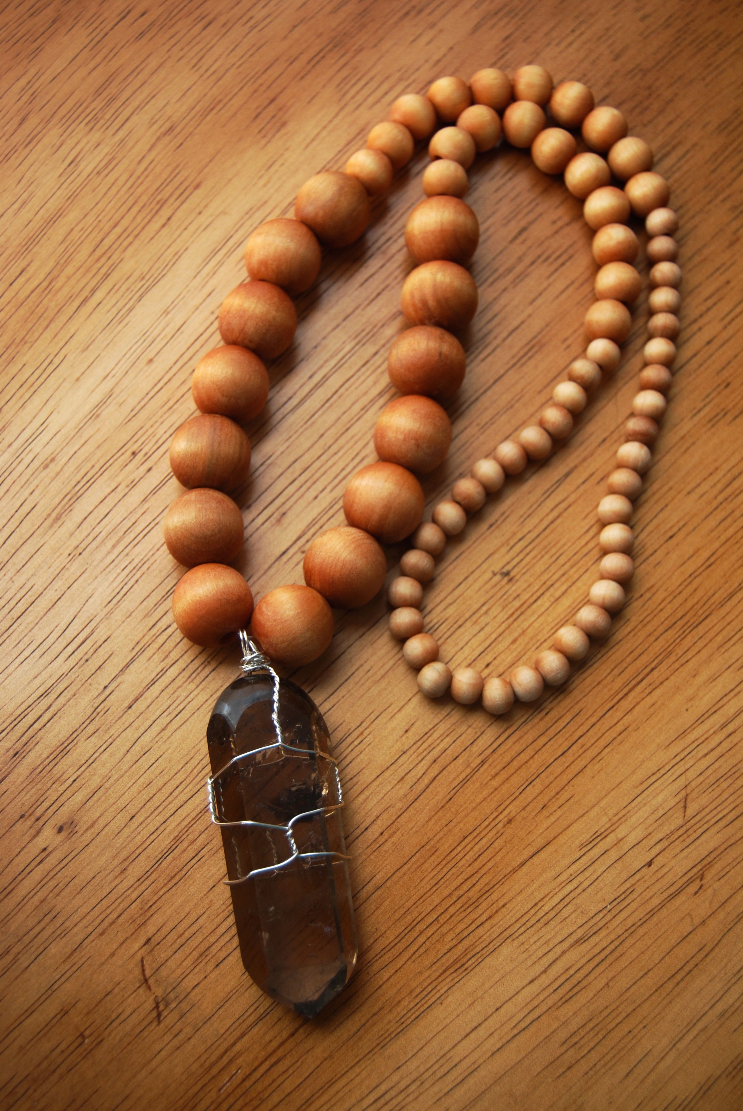Smokey Quartz and Dyed Wood.