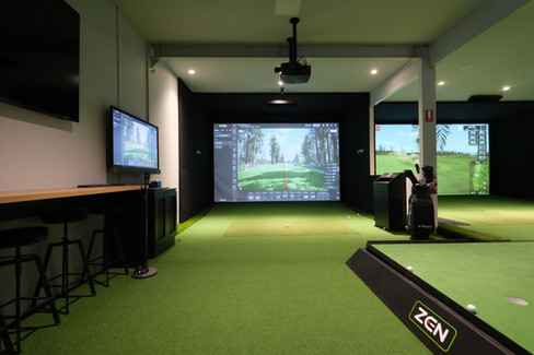 Golfsim Australia demo facility showcasing a custom indoor golf simulator with Uneekor technology and putting green setup.