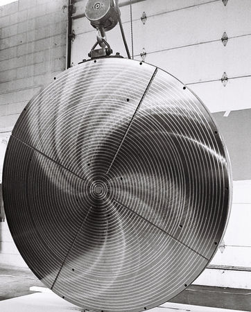 Vintage Image of a Magna-Lock USA HC Series Chuck Being Lifted Upright