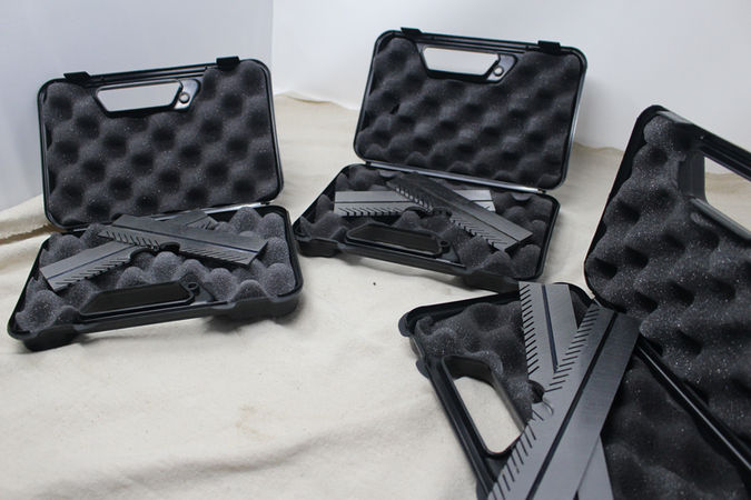 3 Sets of Magna-Vises displayed in their cases.