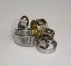 White and yellow gold diamond rings spinning rings