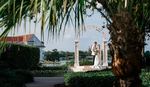 Bride and groom wedding portraits at Disney's Picture Pointe at Disney's Wedding Pavilion at Disney's Grand Floridian Resort and Spa, Photo by Kate Pike Photography