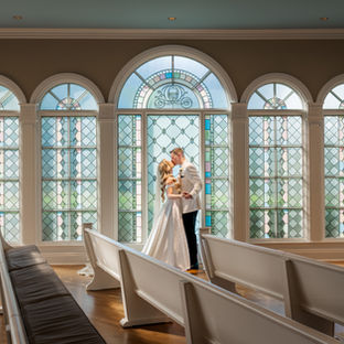 Bride and groom photos at Disney's Wedding Pavilion. Photo by Honeycomb Films. 